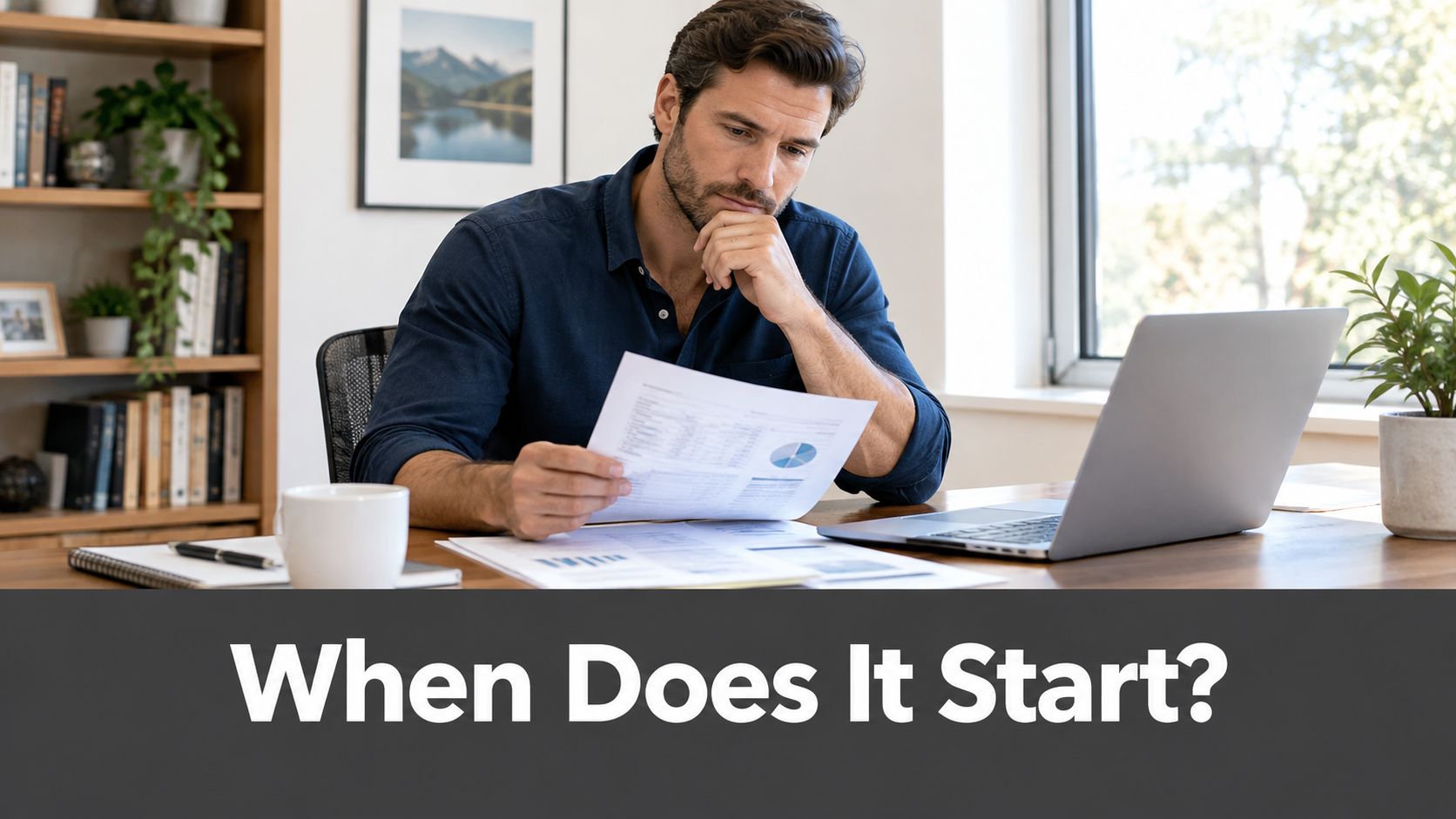 A professional man sitting at a desk reviewing financial documents while thinking about business deadlines.