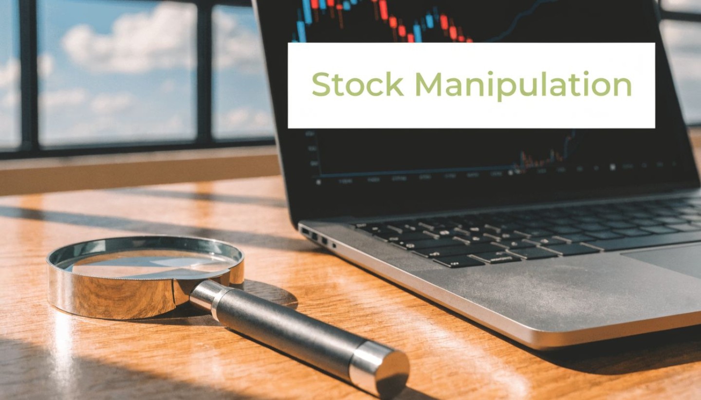 stock-manipulation-definition-magnifying-glass